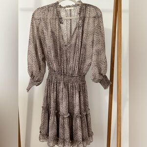 Lovestitch dress. Top part of dress is sheer. There is a slip under the dress.